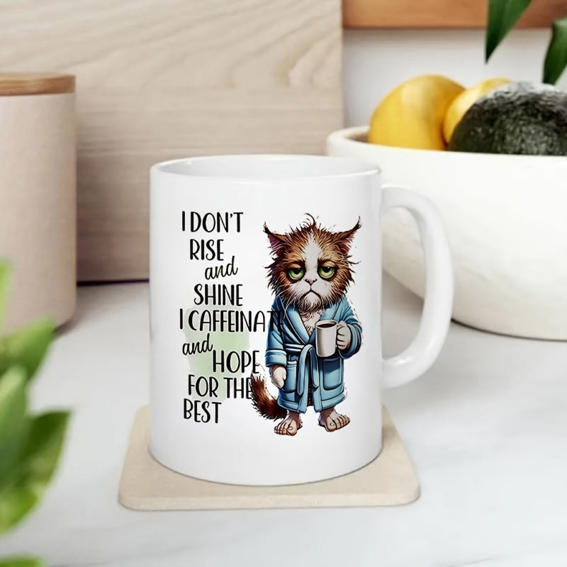 Tailorly White Ceramic 11 oz Mug - I Don't Rise And Shine I Caffeinate And Hope For The Best Grumpy Cartoon Cat Wearing Blue Bathrobe Holding Steaming Coffee Cup