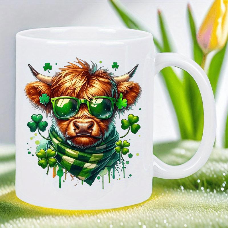 Tailorly White Ceramic 11 oz Mug - Festive Highland Cow Wearing Green Sunglasses And Scarf Among Lucky Shamrocks Highland Cow