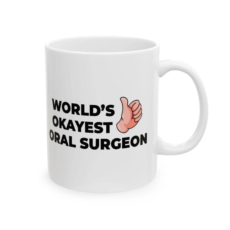 Tailorly White Ceramic 11 oz Mug - Worlds Okayest Oral Surgeon Bold Black Lettering Featuring A Cartoon Thumbs Up Sign Oral Surgeon