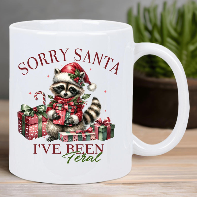 Tailorly White Ceramic 11 oz Mug - Sorry Santa Ive Been Feral Festive Raccoon Wearing Santa Hat Surrounded By Decorative Holiday Gift Boxes Raccoon