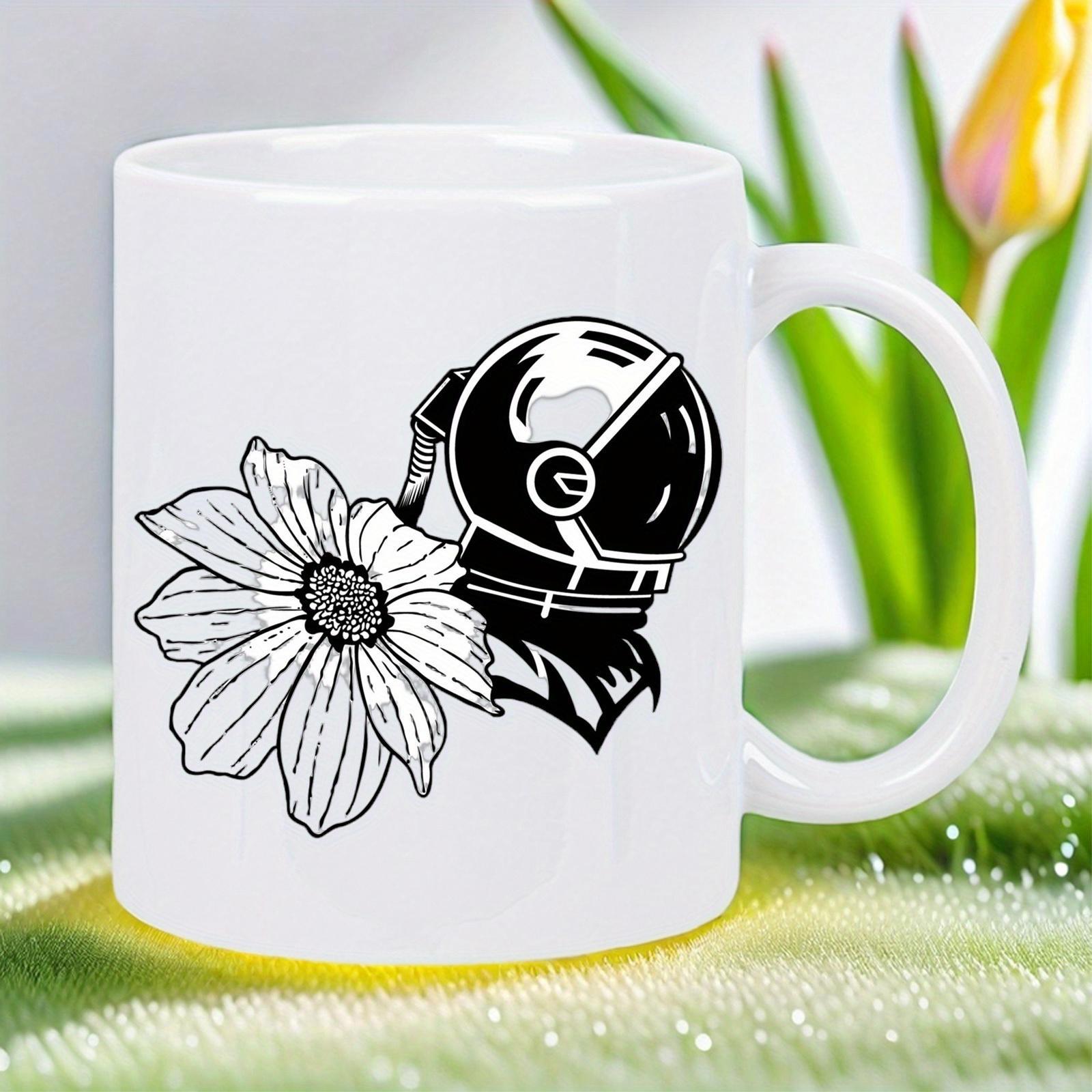 Tailorly White Ceramic 11 oz Mug - Minimalist Black Ink Illustration Of Astronaut Helmet Resting Beside Flower Astronaut