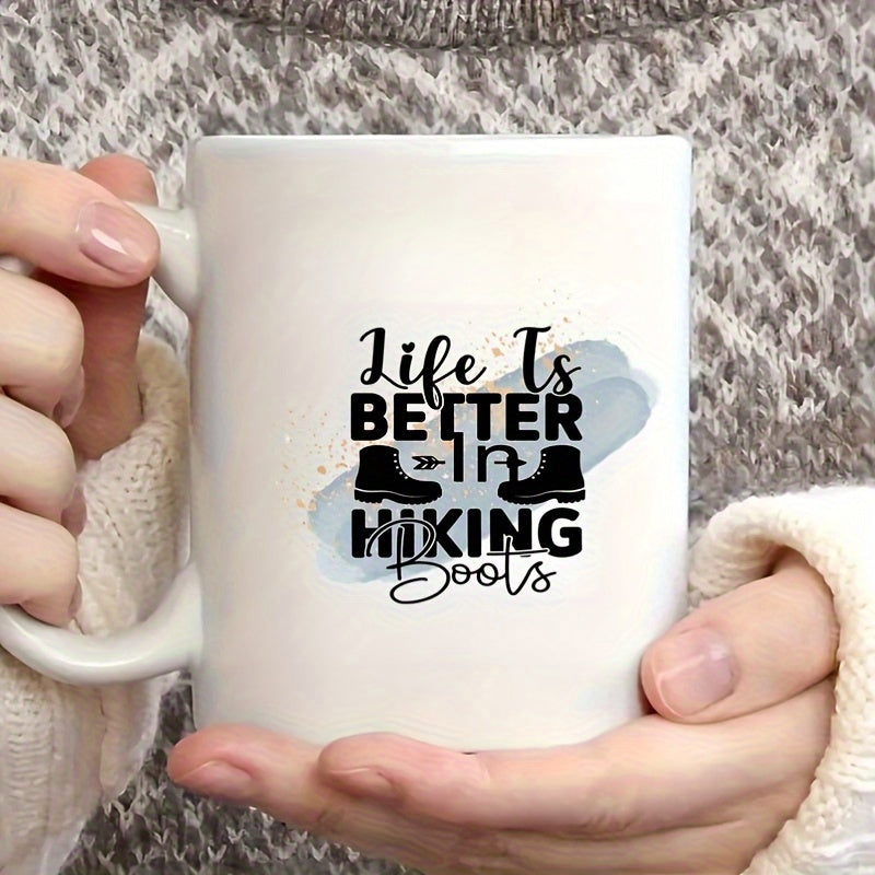 Tailorly White Ceramic 11 oz Mug - Life Is Better In Hiking Boots Silhouette Of Sturdy Boots Over Soft Blue Watercolor Brushstroke With Speckles Hiking Boots