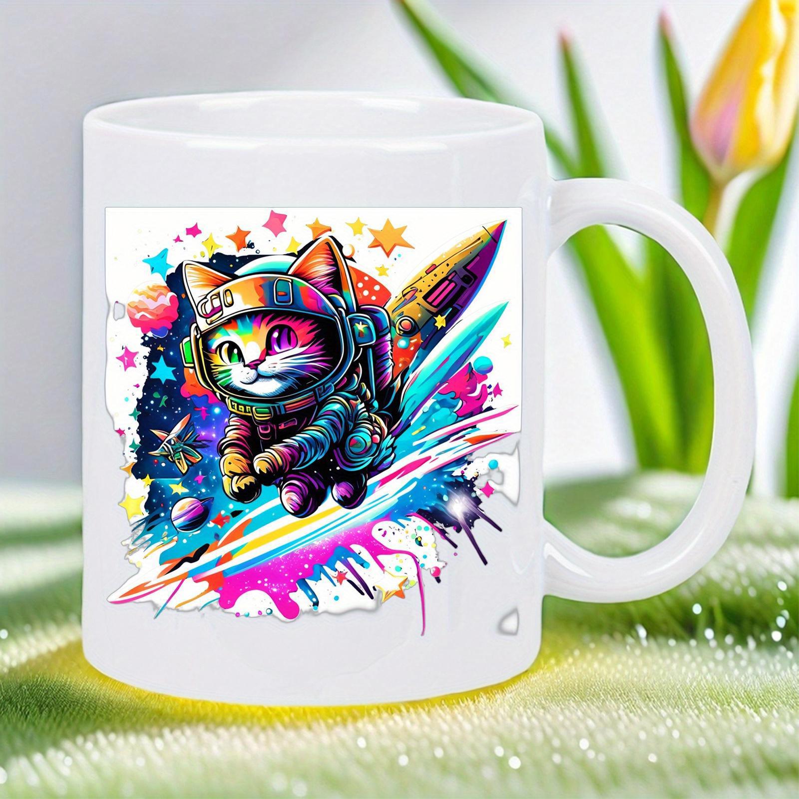 Tailorly White Ceramic 11 oz Mug - Colorful Cosmic Kitten Wearing A Space Suit Among Stars And Paint Splashes Cat
