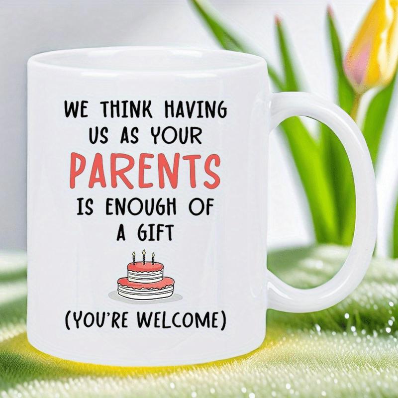 Tailorly White Ceramic 11 oz Mug - We Think Having Us As Your Parents Is Enough Of A Gift Youre Welcome Small Pink Birthday Cake With Three Candles Resting Below