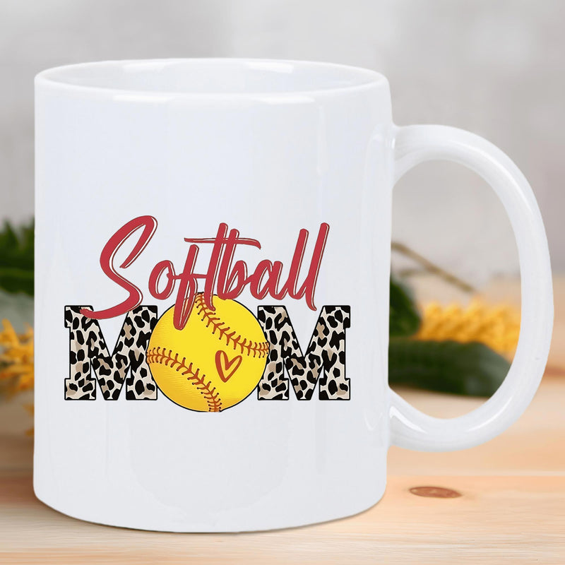 Tailorly White Ceramic 11 oz Mug - Softball Mom Sporty Leopard Print Text Surrounding A Bright Yellow Softball