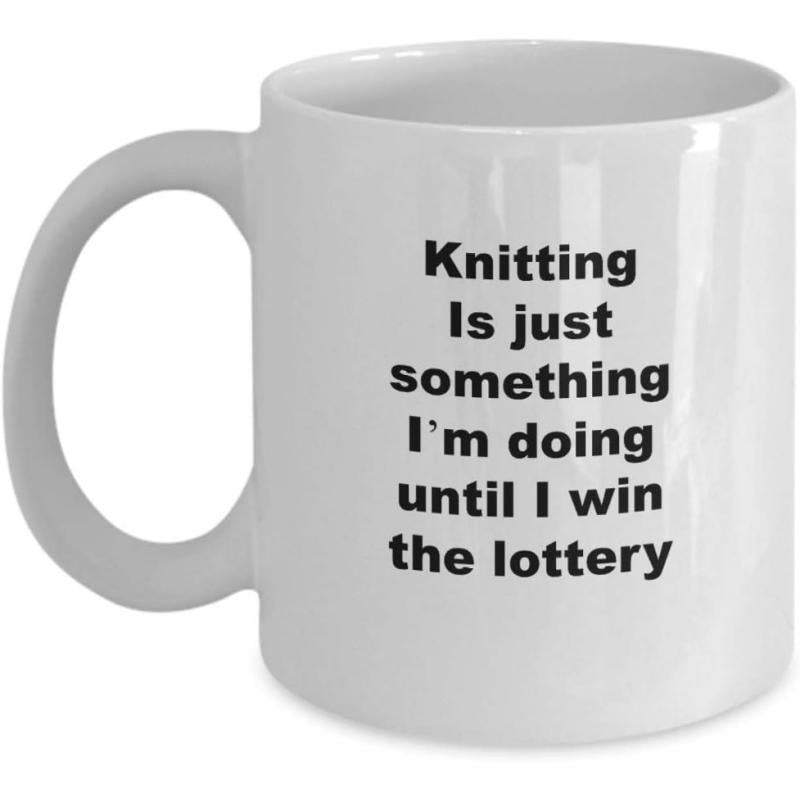 Tailorly White Ceramic 11 oz Mug - Knitting Is Just Something I'm Doing Until I Win The Lottery Simple White Ceramic Vessel Featuring Bold Black Sans Serif