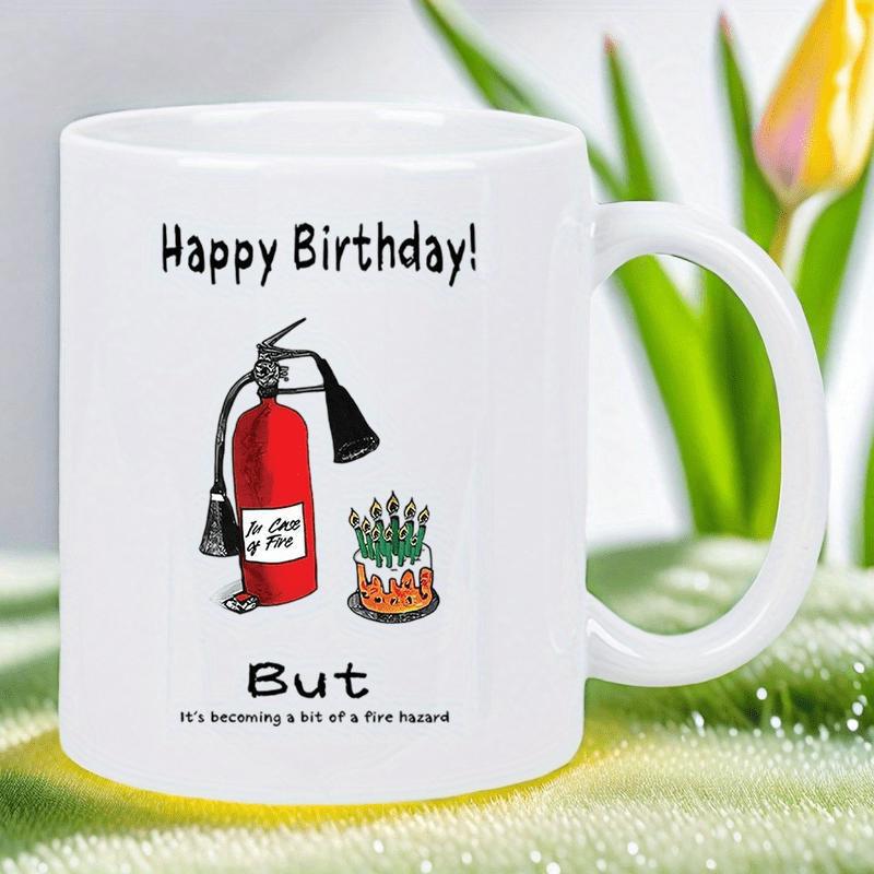 Tailorly White Ceramic 11 oz Mug - Happy Birthday But It Is Becoming A Bit Of A Fire Hazard Red Emergency Tool Beside Small Cake Covered In Numerous Green Lighted