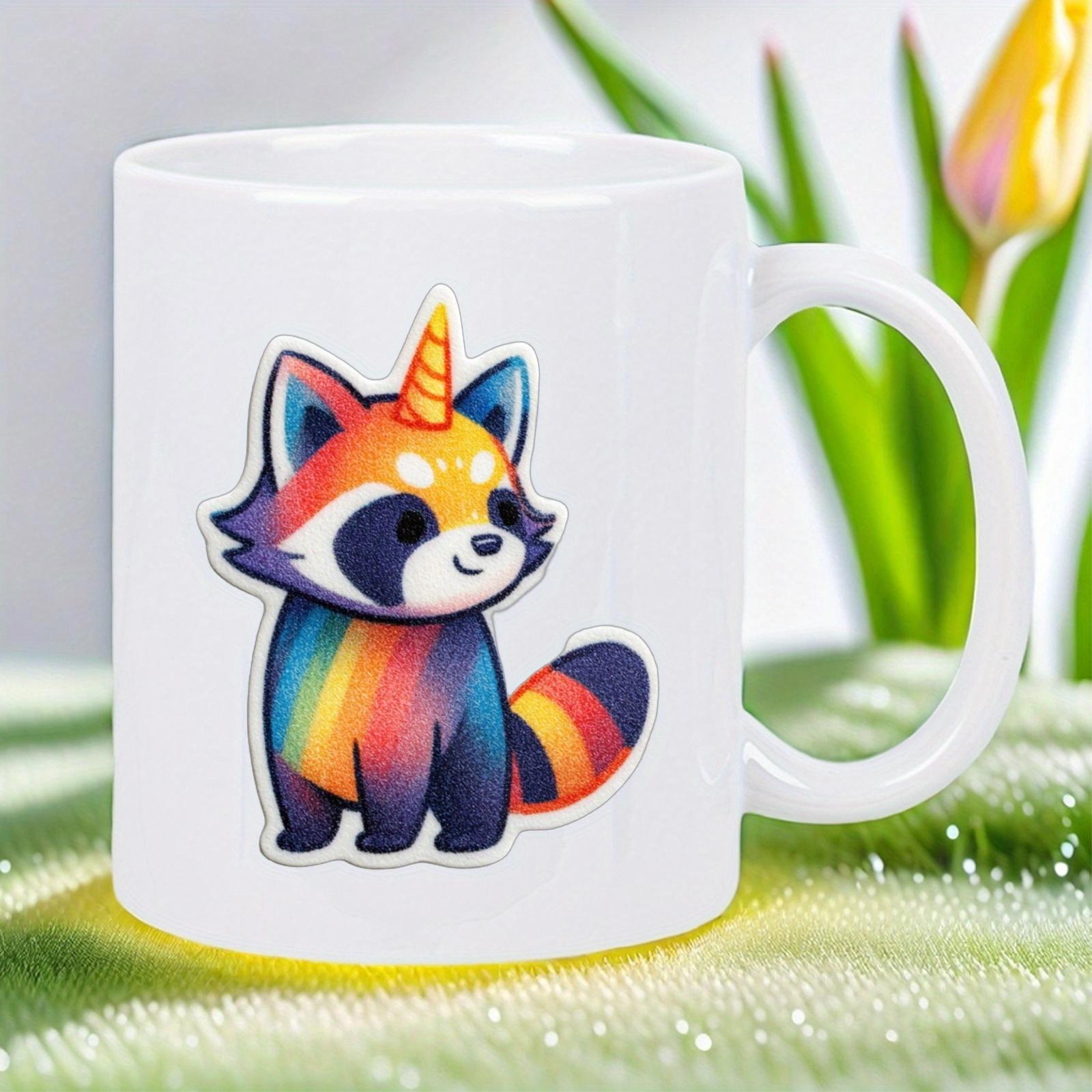 Tailorly White Ceramic 11 oz Mug - Vibrant Rainbow Colored Adorable Cartoon Creature Wearing A Golden Unicorn Horn Raccoon