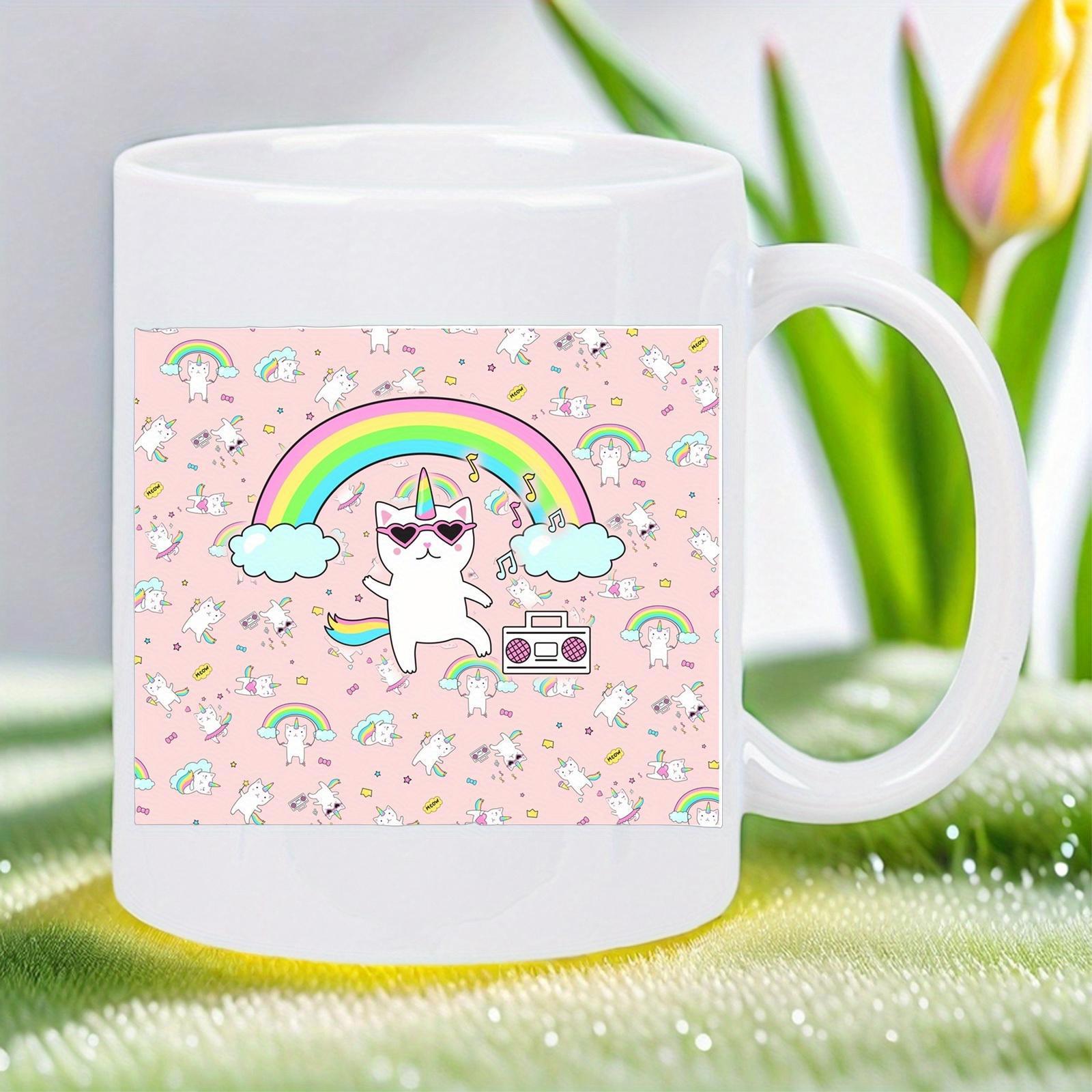 Tailorly White Ceramic 11 oz Mug - Dancing Whimsical White Kitten Wearing Heart Sunglasses Under Vibrant Rainbow Clouds Cat