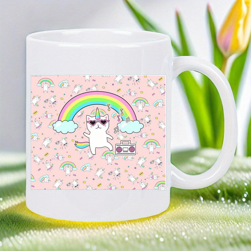 Tailorly White Ceramic 11 oz Mug - Dancing Whimsical White Kitten Wearing Heart Sunglasses Under Vibrant Rainbow Clouds Cat