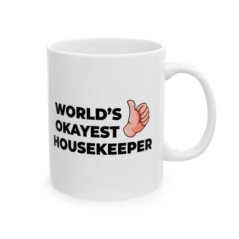 Tailorly White Ceramic 11 oz Mug - Worlds Okayest Housekeeper Bold Black Lettering Beside A Friendly Cartoon Thumbs Up Hand