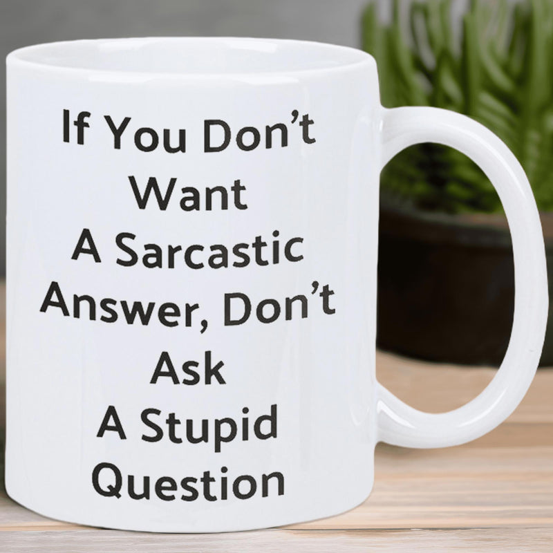 Tailorly White Ceramic 11 oz Mug - If You Don't Want A Sarcastic Answer Don't Ask A Stupid Question Minimalist White Ceramic Vessel Sitting On A Plain Wooden