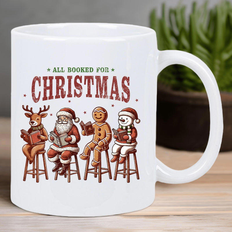 Tailorly White Ceramic 11 oz Mug - All Hooked For Christmas Festive Characters Sitting On High Stools While Reading Books Peacefully Mug