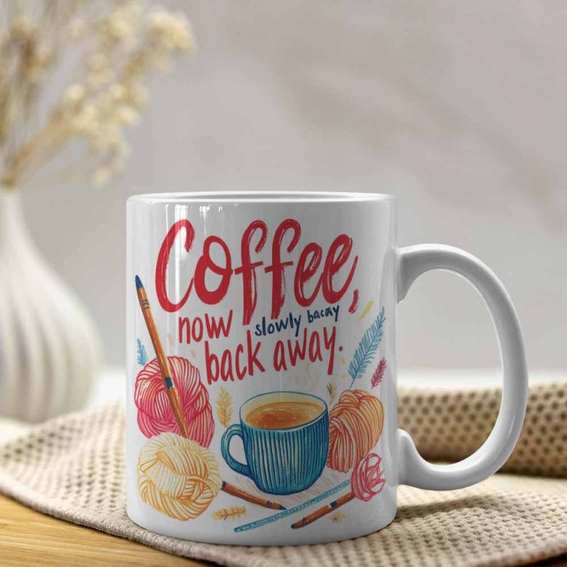 Tailorly White Ceramic 11 oz Mug - Coffee Now Slowly Back Away Hand Drawn Yarn Balls With Knitting Needles Beside A Blue Cup Mug