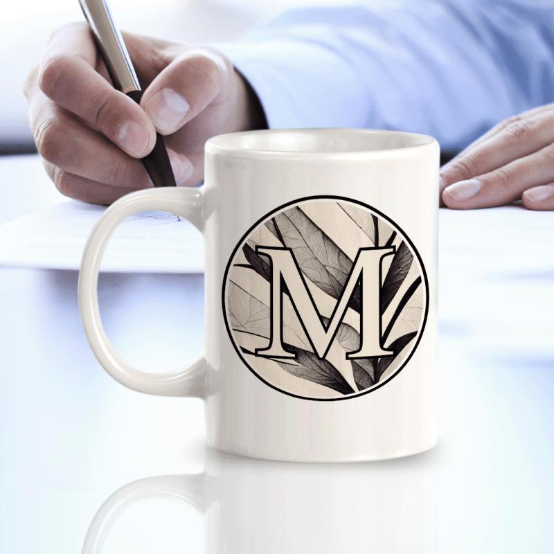 Tailorly White Ceramic 11 oz Mug - M Elegant Botanical Leaves Within A Circular Border Featuring A Bold Serif Letter