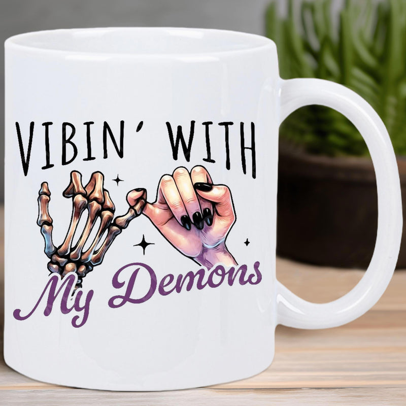 Tailorly White Ceramic 11 oz Mug - Vibin With My Demons Skeleton Hand And Human Hand Pinky Promise Under Small Twinkling Stars Mug