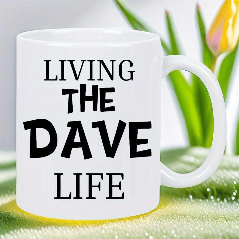 Tailorly White Ceramic 11 oz Mug - Living The Dave Life Minimalist White Ceramic Vessel With Bold Black Typographic Letters On Grass Mug