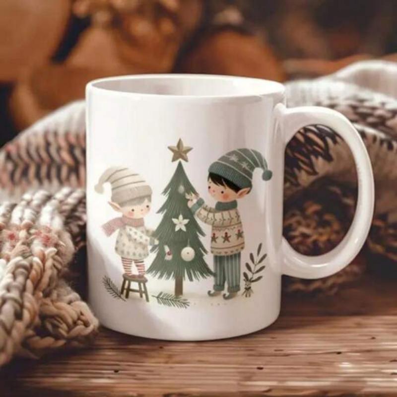 Tailorly White Ceramic 11 oz Mug - Two Little Elves Wearing Knitted Sweaters Decorating A Festive Star Topped Christmas Tree
