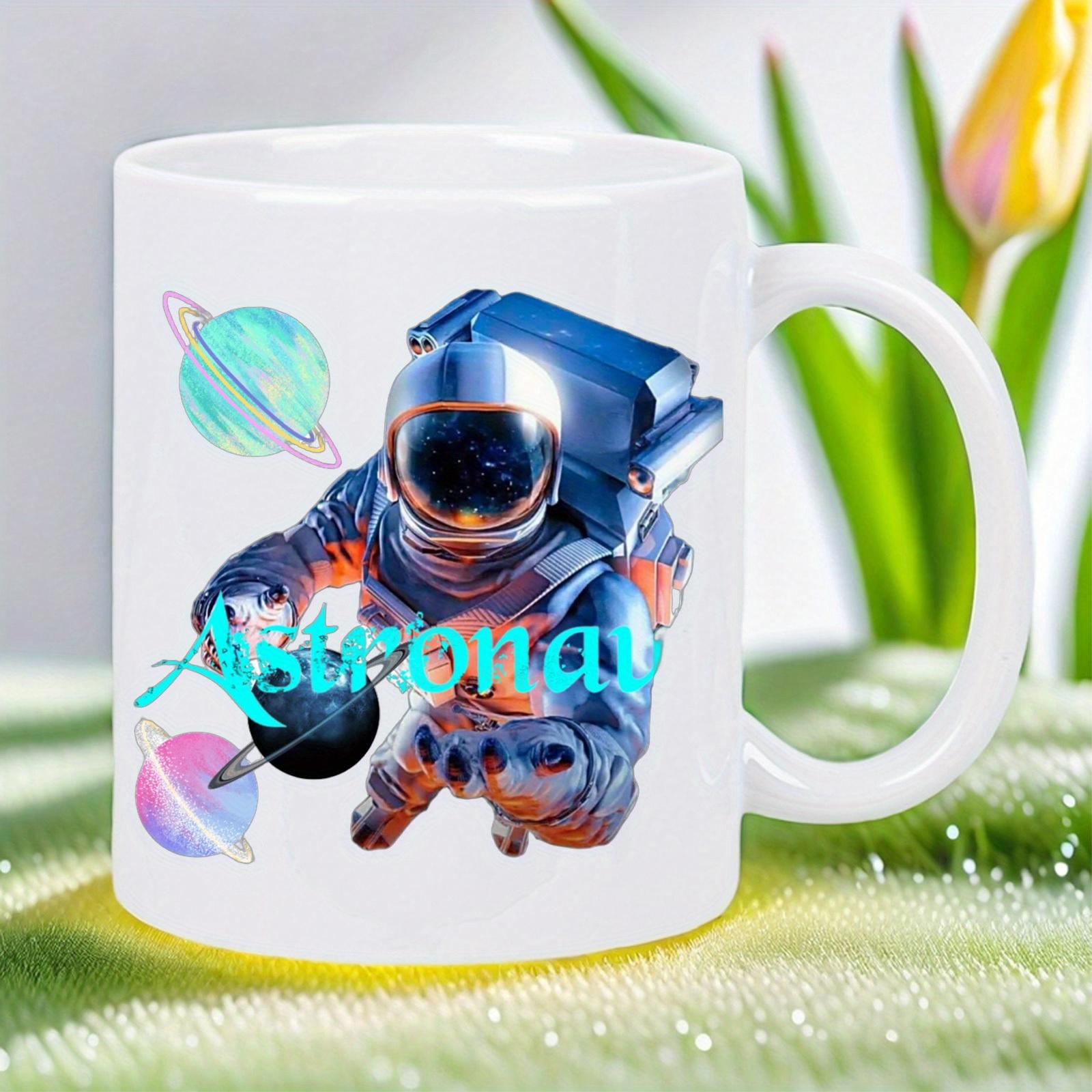 Tailorly White Ceramic 11 oz Mug - Astronaut Floating Through Deep Space Among Colorful Glowing Rings And Distant Planets Astronaut