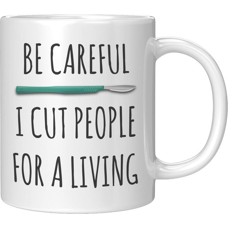 Tailorly White Ceramic 11 oz Mug - Be Careful I Cut People For A Living Sharp Medical Instrument With A Green Handle And Steel Blade Scalpel