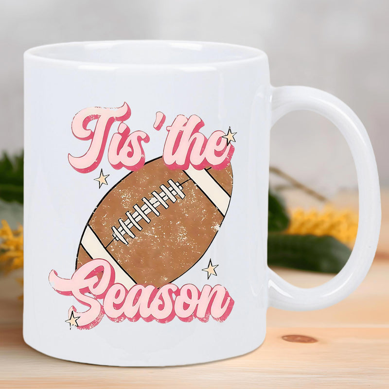 Tailorly White Ceramic 11 oz Mug - Tis The Season Classic Textured Brown American Football With Pink Retro Script Letters And Stars Football