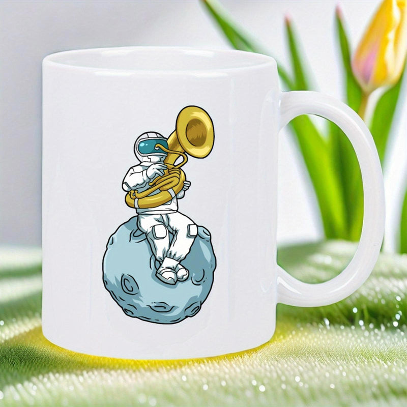 Tailorly White Ceramic 11 oz Mug - Whimsical Cartoon Character Playing Golden Brass Tuba Sitting On Moon Astronaut