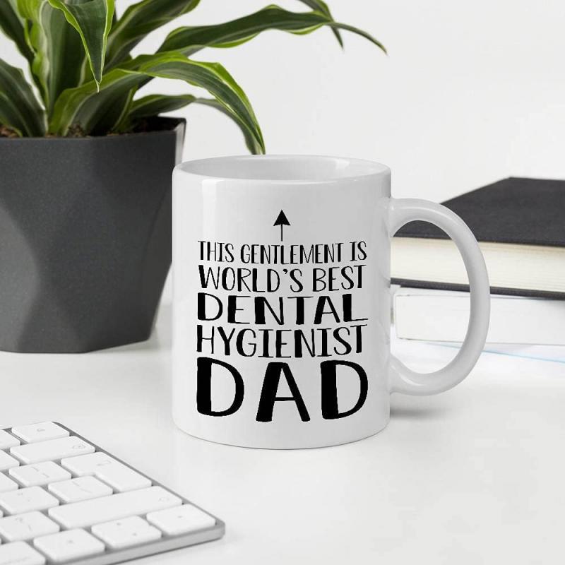 Tailorly White Ceramic 11 oz Mug - This Gentleman Is Worlds Best Dental Hygienist Dad Minimalist Upward Pointing Arrow Centered On A Smooth Ceramic Surface Mug