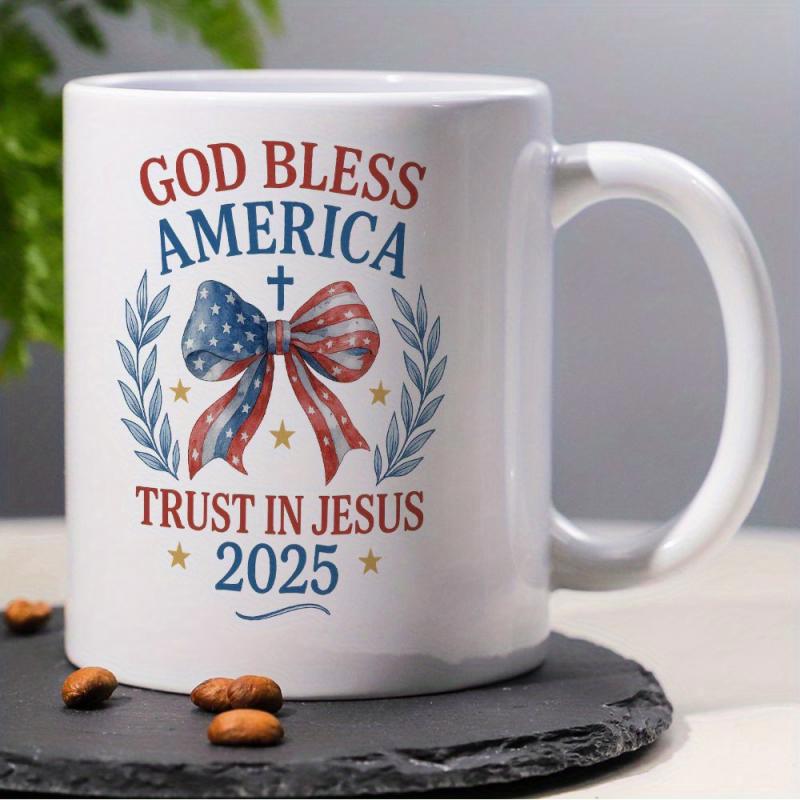 Tailorly White Ceramic 11 oz Mug - God Bless America Trust In Jesus 2025 Patriotic Stars And Stripes Patterned Bow Between Elegant Wreath Leaves Bow