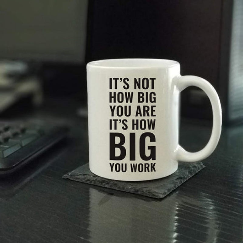 Tailorly White Ceramic 11 oz Mug - Its Not How Big You Are Its How Big You Work Minimalist Style On A Plain In Office Setting Mug