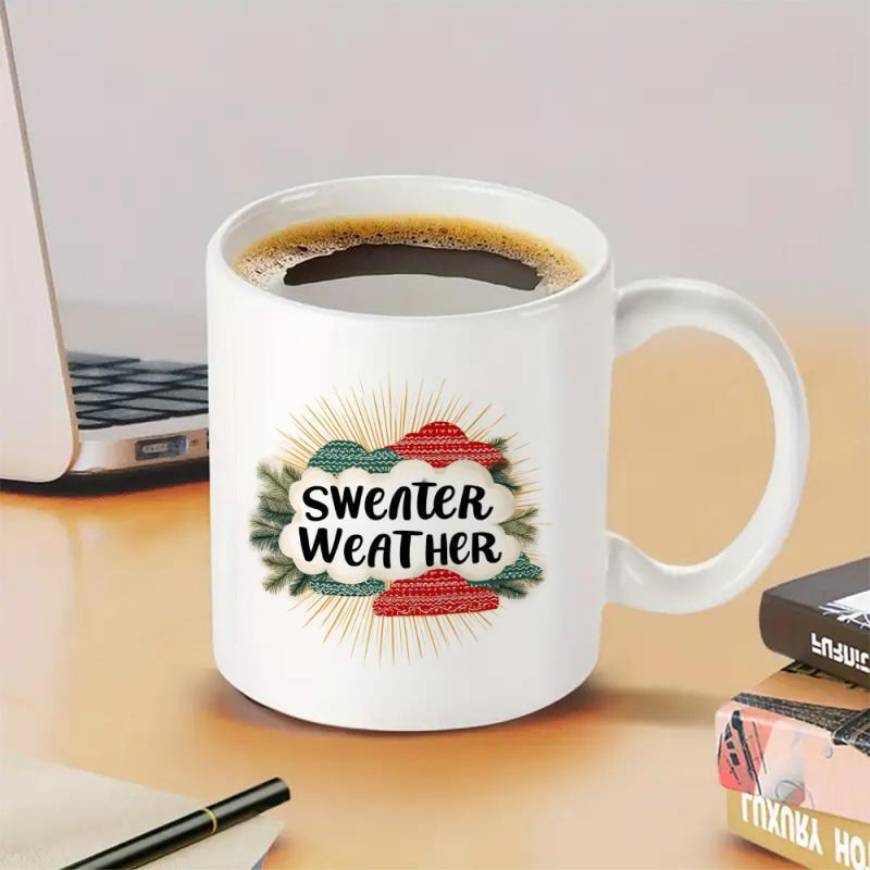 Tailorly White Ceramic 11 oz Mug - Sweater Weather Evergreen Pine Branches Surrounding Red Winter Hat With Sunburst Lines Mug
