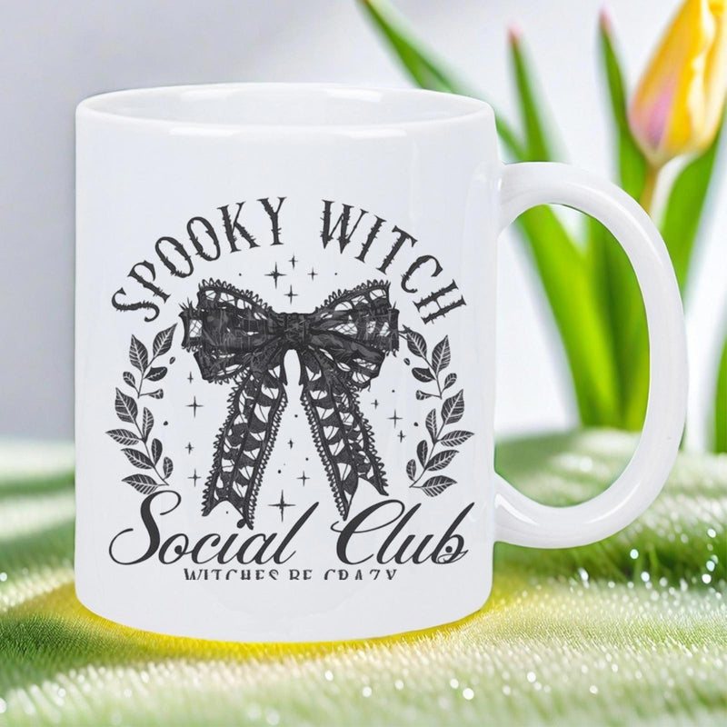 Tailorly White Ceramic 11 oz Mug - Spooky Witch Social Club Intricately Patterned Black Lace Bow Surrounded By Stars And Delicate Leaves Bow
