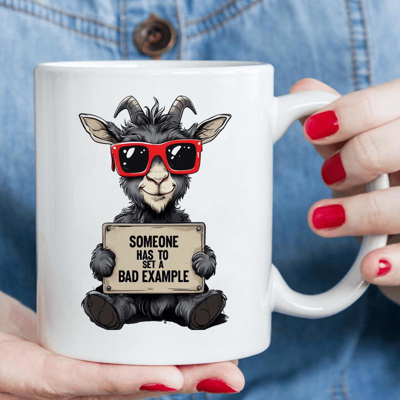 Tailorly White Ceramic 11 oz Mug - Someone Has To Set A Bad Example Funny Cartoon Wearing Red Sunglasses And Holding A Small Sign Goat