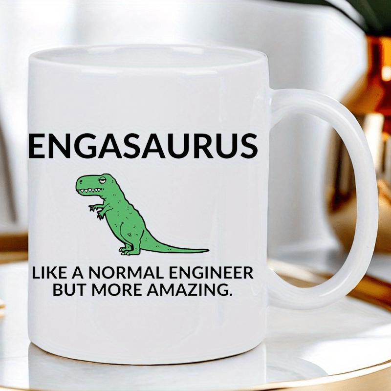 Tailorly White Ceramic 11 oz Mug - Engasaurus Like A Normal Engineer But More Amazing Small Green Cartoon Dinosaur Standing On White Surface Dinosaur