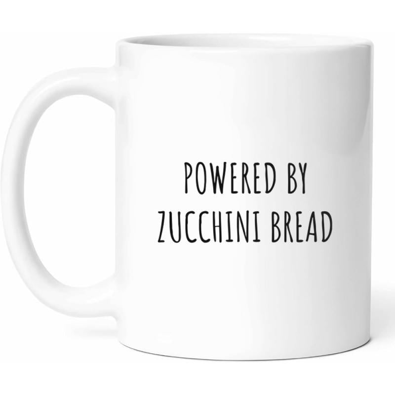 Tailorly White Ceramic 11 oz Mug - Powered By Zucchini Bread Minimalist White Ceramic Vessel With Bold Black Typography Mug