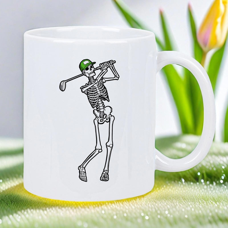 Tailorly White Ceramic 11 oz Mug - Athletic Skeleton In Green Cap Swinging A Golf Club Mid Swing Skeleton