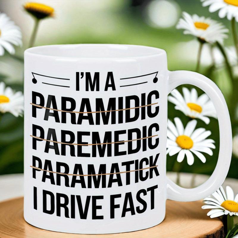 Tailorly White Ceramic 11 oz Mug - Im A Paramedic I Drive Fast Clean White Surface With Musical Notes And Bold Typographic Strikethrough Details Sign