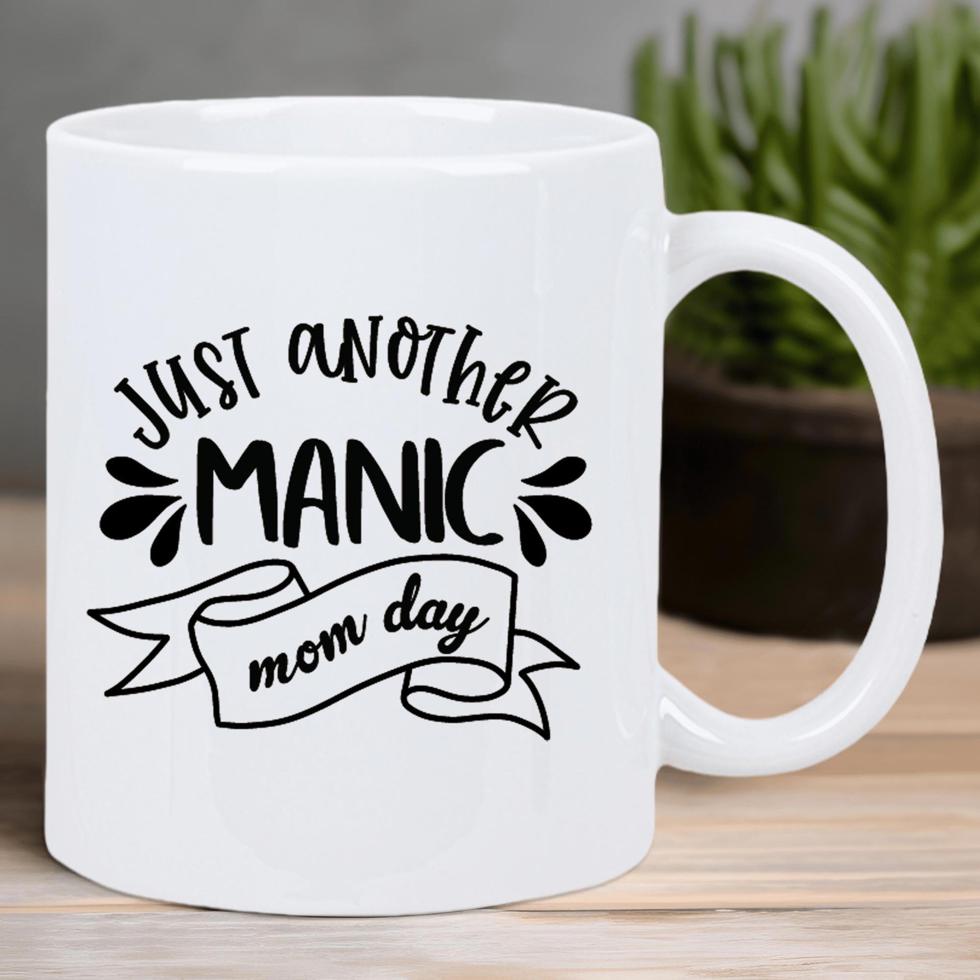 Tailorly White Ceramic 11 oz Mug - Just Another Manic Mom Day Minimalist Black Decorative Typography Featuring Flowing Ribbon And Stylized Droplets Banner