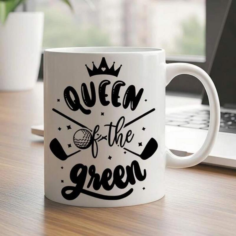Tailorly White Ceramic 11 oz Mug - Queen Of The Green Elegant Black Crown Above Crossed Clubs And Detailed Golf Ball Sign