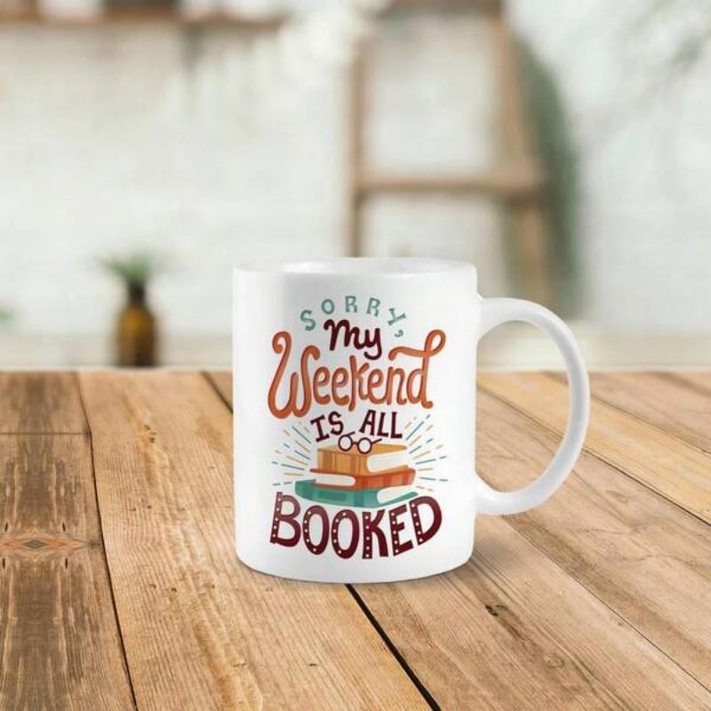 Tailorly White Ceramic 11 oz Mug - Sorry My Weekend Is All Booked Stacked Colorful Hardcover Books With Reading Glasses Resting On Top Bookstack
