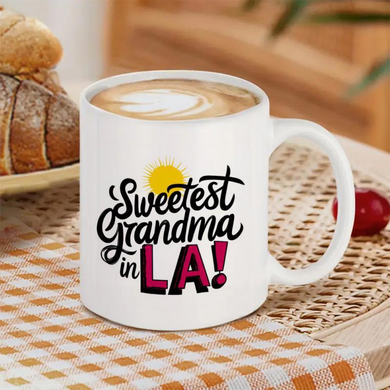 Tailorly White Ceramic 11 oz Mug - Sweetest Grandma In LA Minimalist Yellow Sun With Black Script And Pink Block Lettering Mug