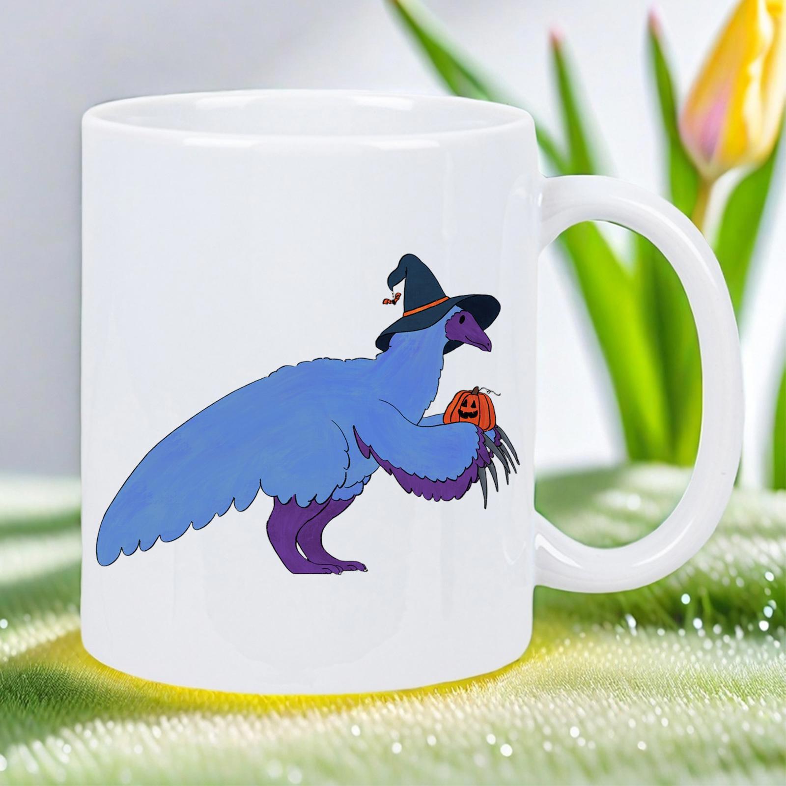 Tailorly White Ceramic 11 oz Mug - Blue Feathered Prehistoric Monster Wearing Witch Hat Holding Small Carved Pumpkin Dinosaur