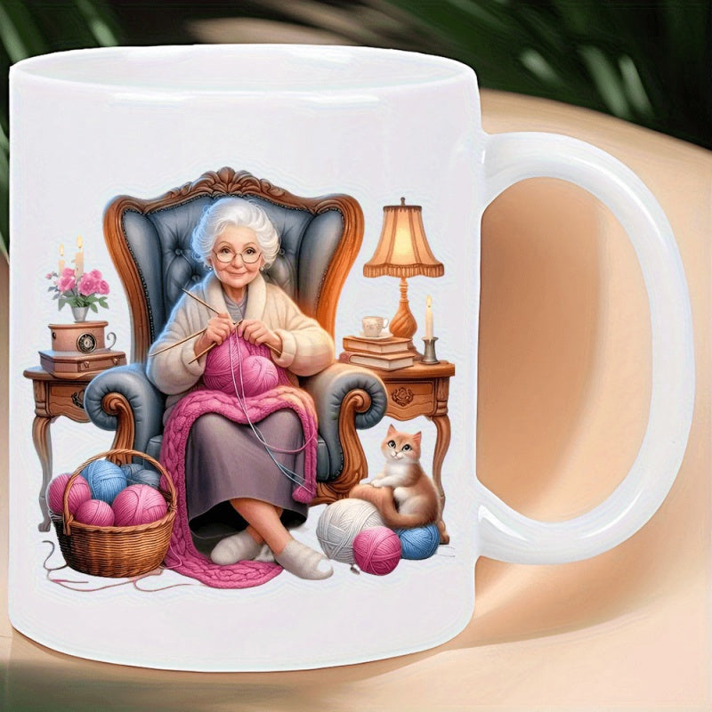 Tailorly White Ceramic 11 oz Mug - Graceful Elderly Woman Knitting In Blue Armchair Beside Soft Colorful Yarn Grandmother