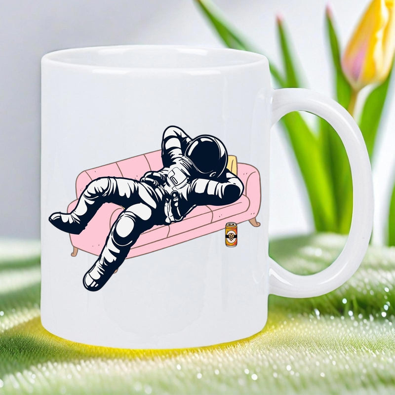 Tailorly White Ceramic 11 oz Mug - Relaxing Astronaut Resting On A Pink Sofa In Deep Space Style Astronaut