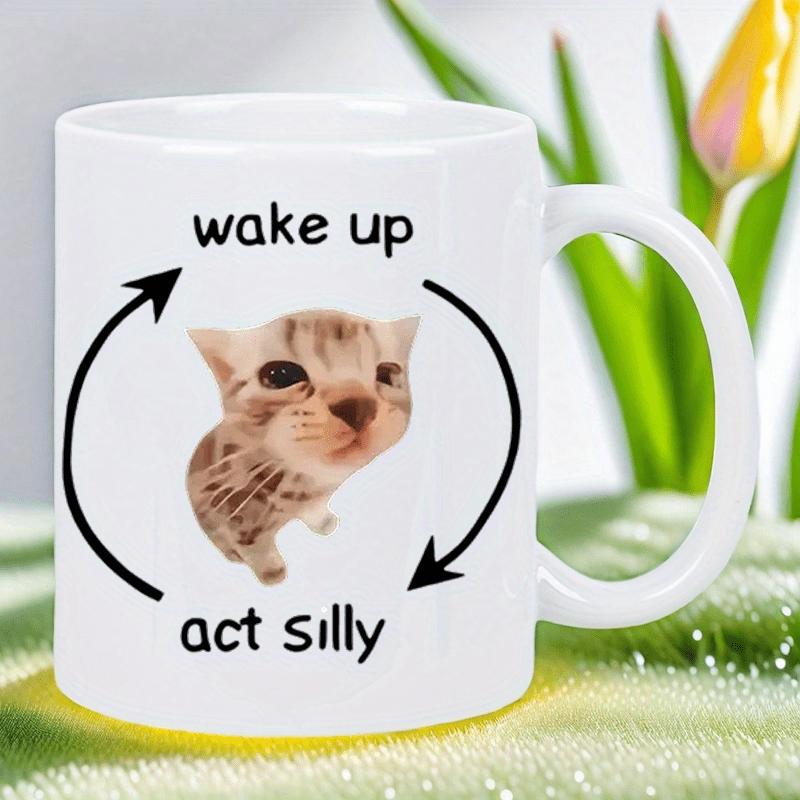 Tailorly White Ceramic 11 oz Mug - Wake Up Act Silly Tiny Wide Eyed Kitten Centered Between Black Circular Moving Arrows Kitten