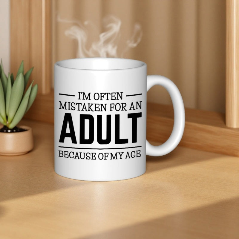 Tailorly White Ceramic 11 oz Mug - Im Often Mistaken For An Adult Because Of My Age Minimalist White Ceramic With Steaming Vapor And Clean Black Bold Typography