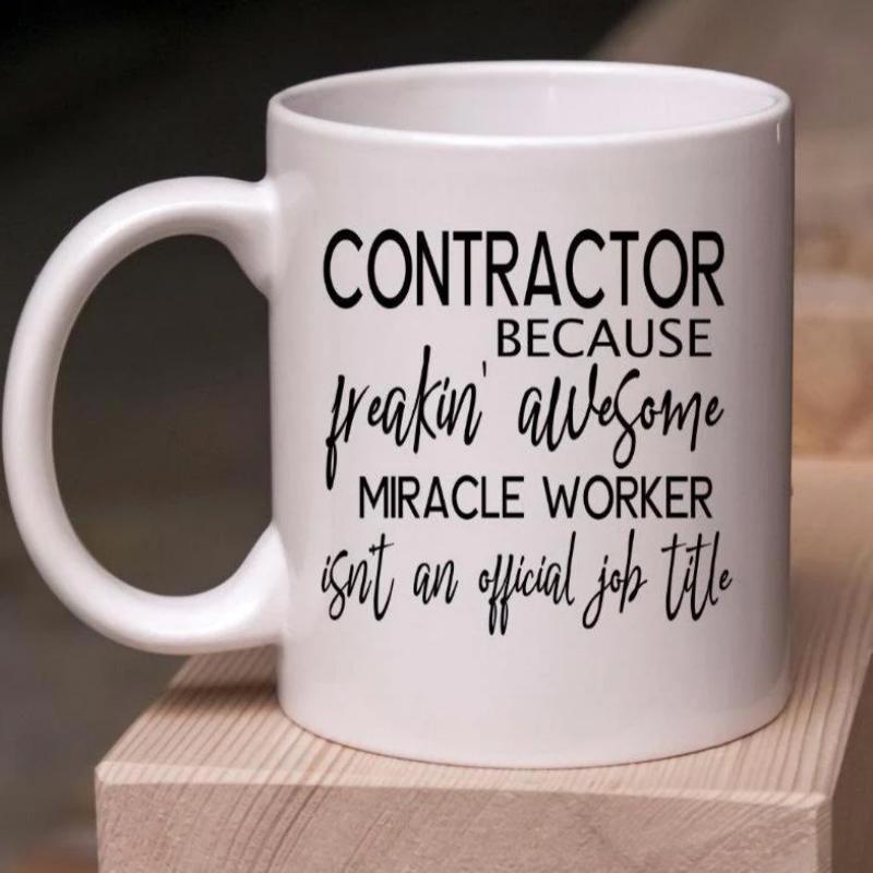 Tailorly White Ceramic 11 oz Mug - Contractor Because Freakin Awesome Miracle Worker Isnt An Official Job Title Minimalist White Ceramic Vessel Sitting On A