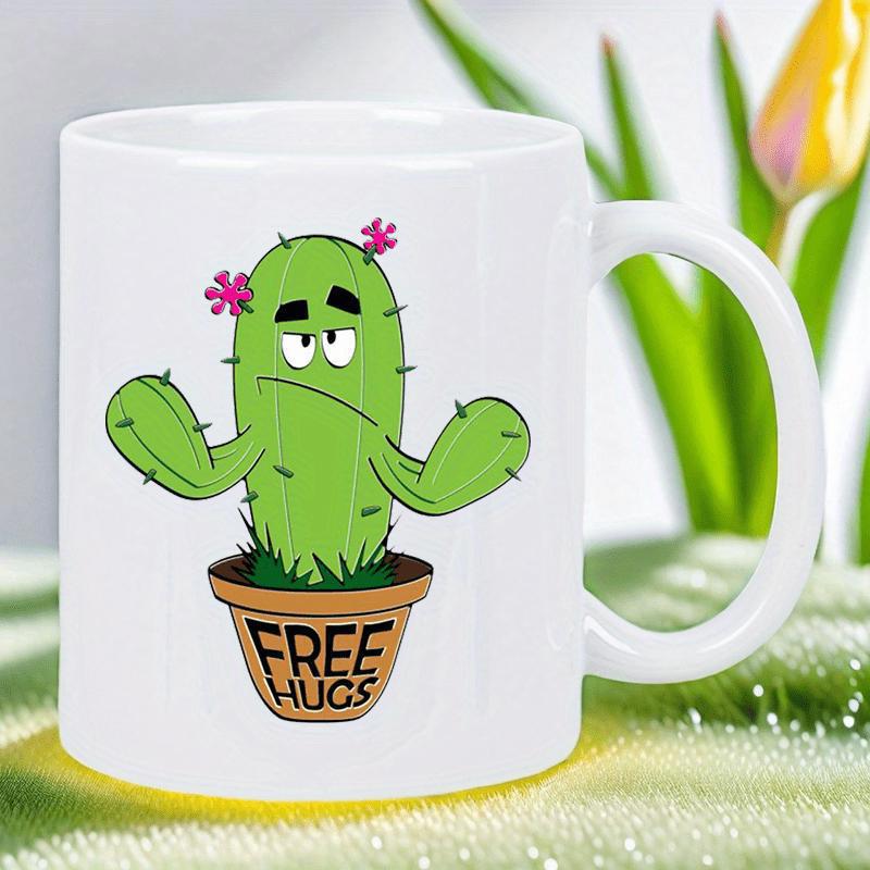 Tailorly White Ceramic 11 oz Mug - Free Hugs Prickly Green Cactus With Grumpy Face In Brown Pot With Pink Flowers Cactus