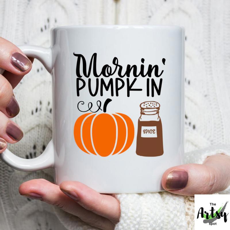 Tailorly White Ceramic 11 oz Mug - Mornin Pumpkin Spice Vibrant Orange Autumn Vegetable Beside A Rustic Brown Shaker Jar Pumpkin