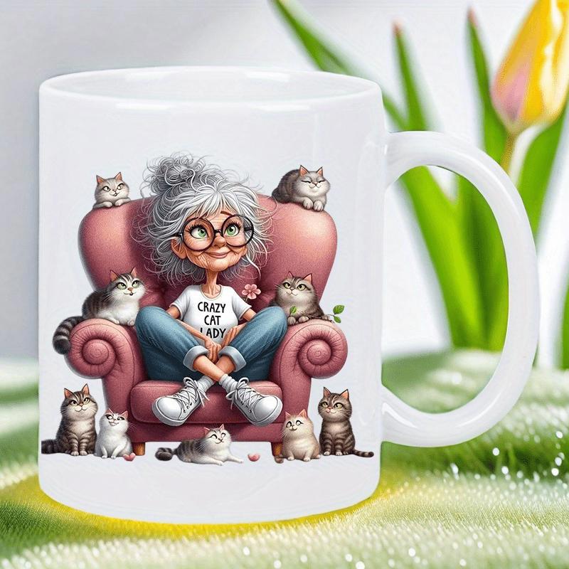 Tailorly White Ceramic 11 oz Mug - Crazy Cat Lady Elderly Woman Sitting In Pink Armchair Surrounded By Many Playful Fluffy Cats Lady