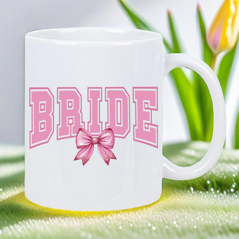 Tailorly White Ceramic 11 oz Mug - Bride Pink Collegiate Style Letters Decorated With An Elegant Ribbon Bow Mug